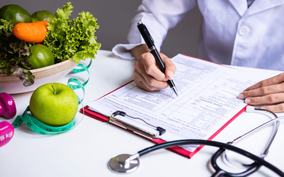 doctor writing on clip board